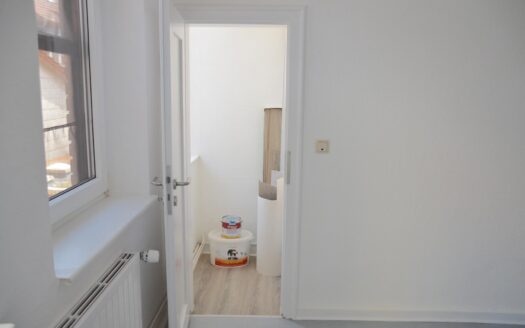 WOHN- u. GESCHÄFTSHAUS im Herzen von KIRCHHAIN – RENDITEOBJEKT